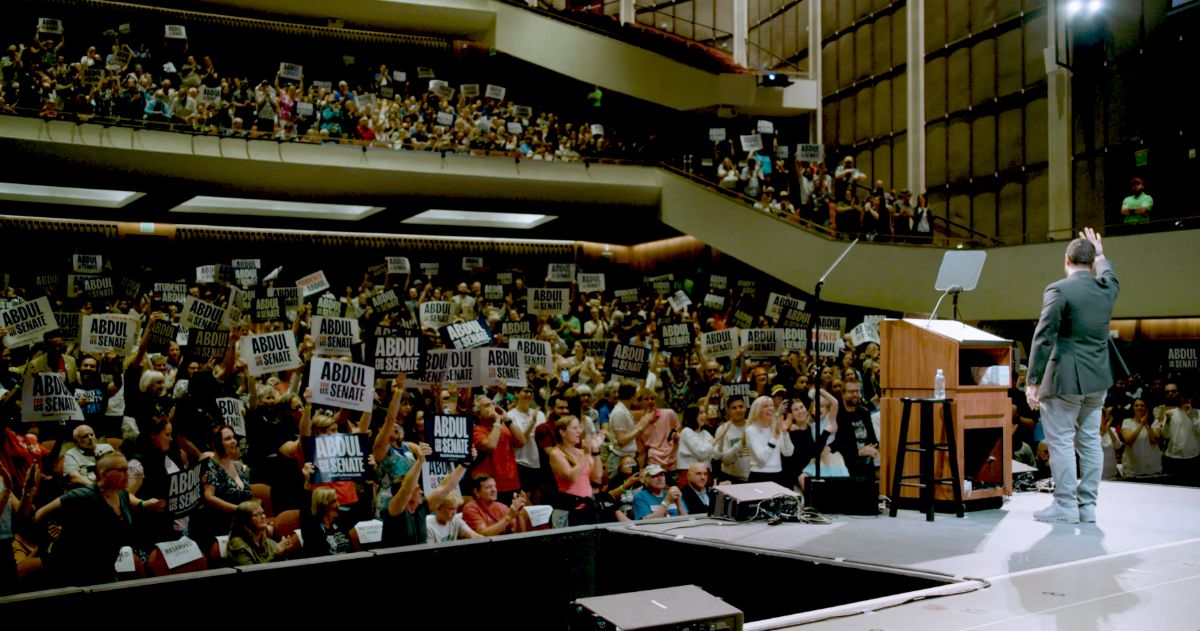 Abdul with a large crowd of supporters