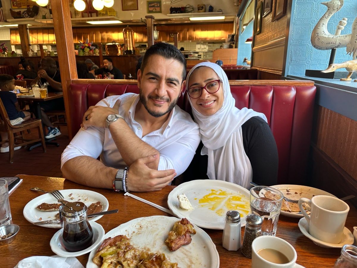 Abdul and Sarah eating breakfast