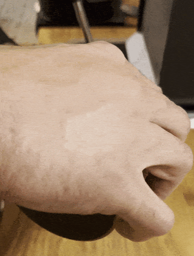 A GIF of Abdul pouring latte art