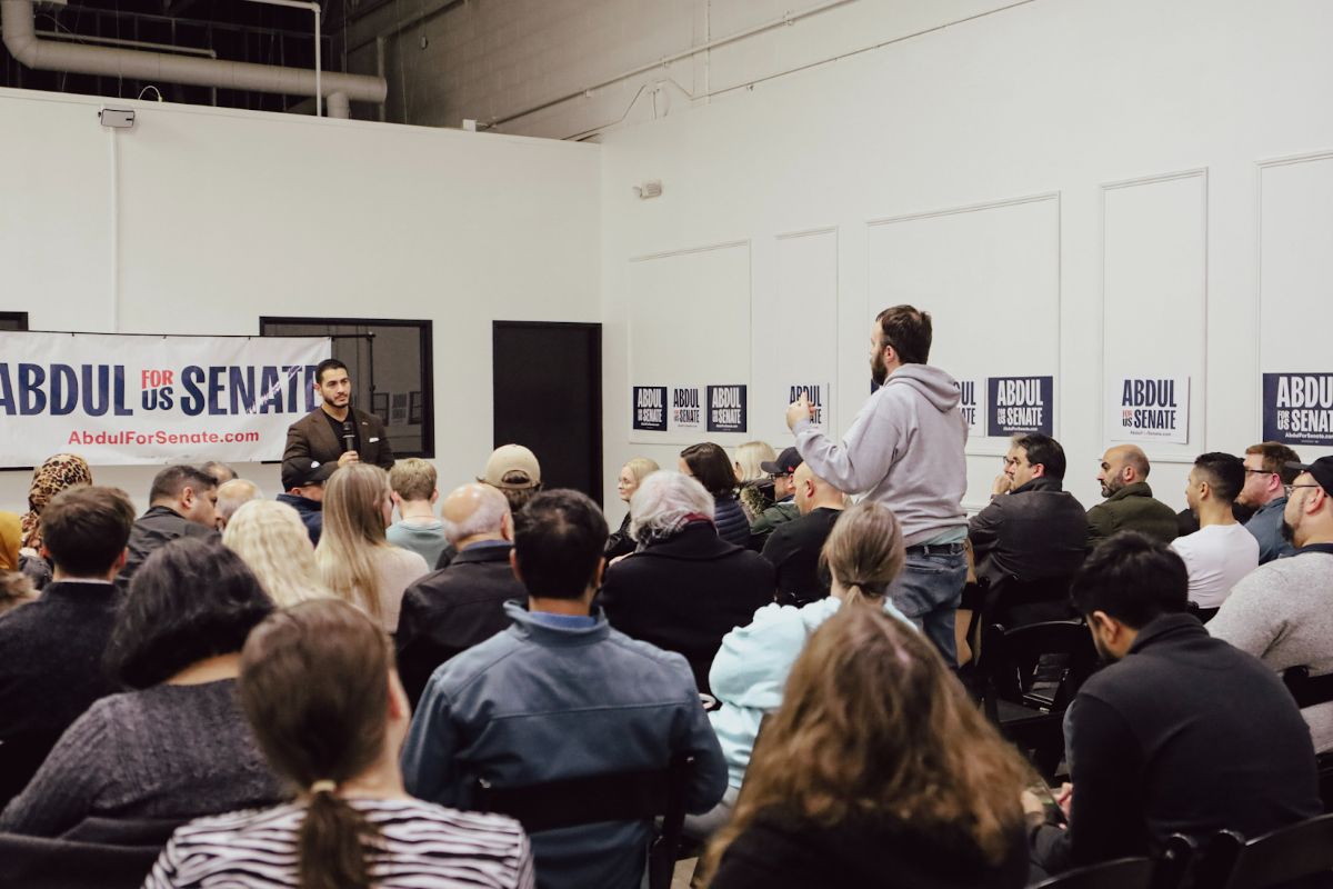 A crowd shot of a town hall.