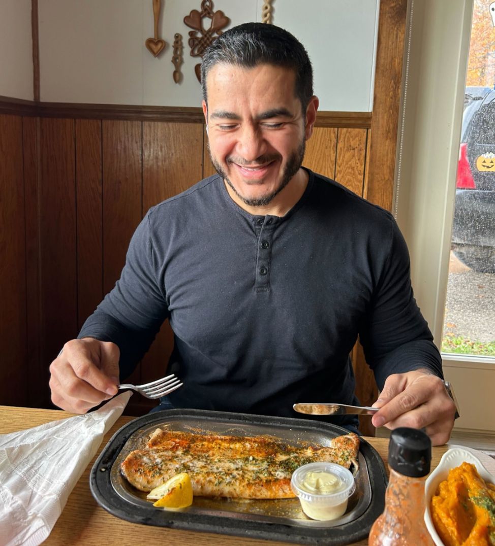 Abdul eating a whitefish Abdul eating a whitefish